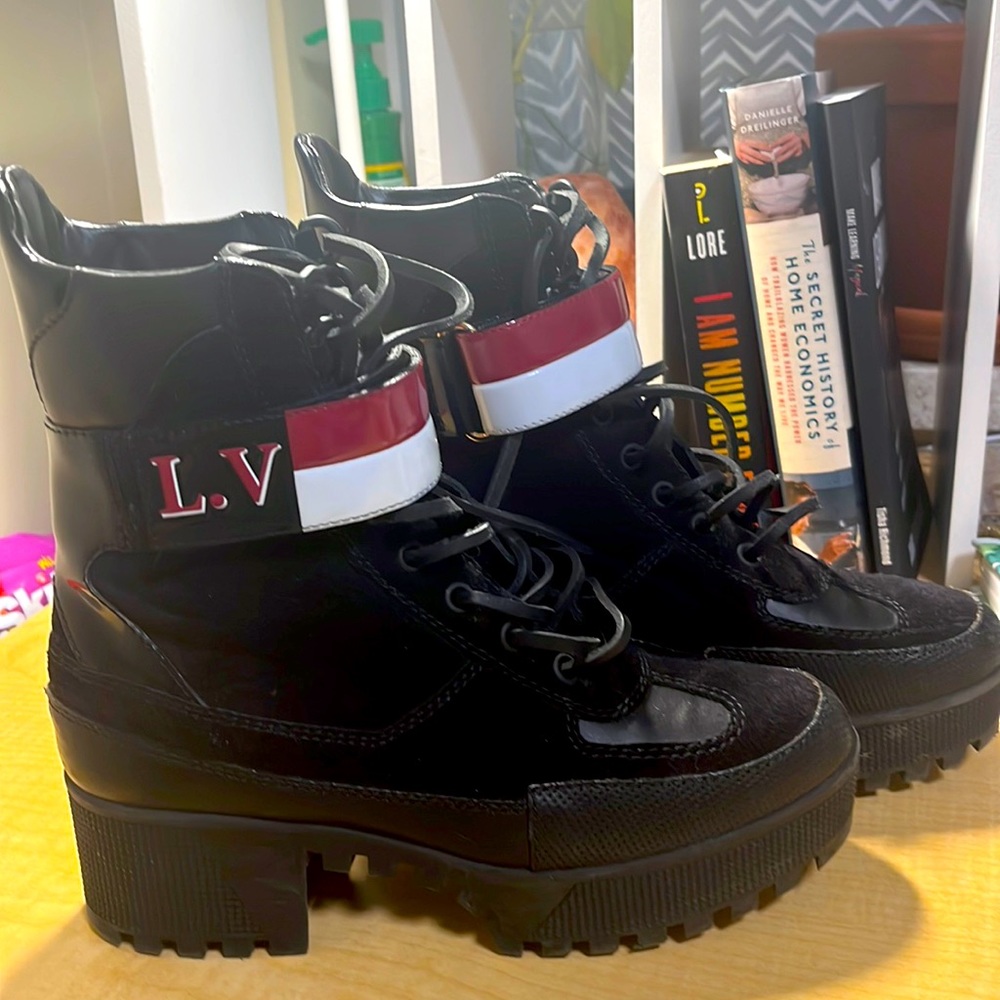 Louis Vuitton platform black boots with a red and white strap
